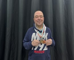 Barry Churchill with his Special Olympics medals