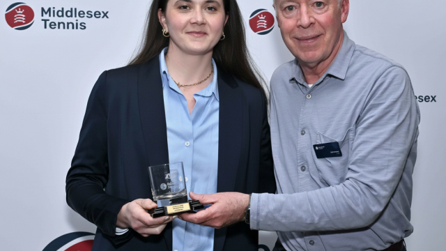 Corina collects the award from Phil Veasey of Middlesex Tennis