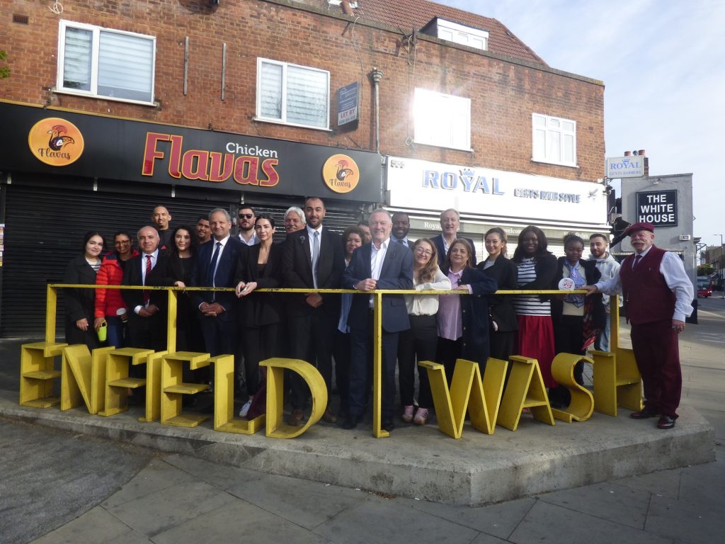 Steve Reed (centre) was in Enfield Wash today to promote the &pound;20m Pride in Place funding his government has awarded the area