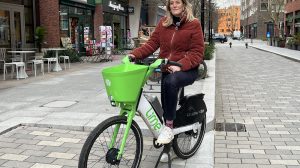 Phoebe Slack on a Lime bike (credit Kumail Jaffer/LDRS)