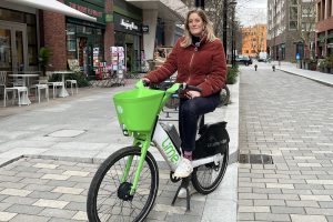 Phoebe Slack on a Lime bike (credit Kumail Jaffer/LDRS)