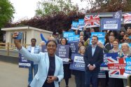 Conservate Party leader Kemi Badenoch poses for a selfie with local activists