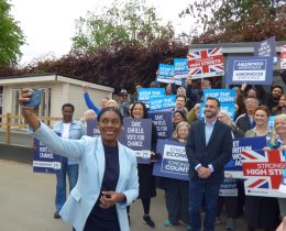 Conservate Party leader Kemi Badenoch poses for a selfie with local activists