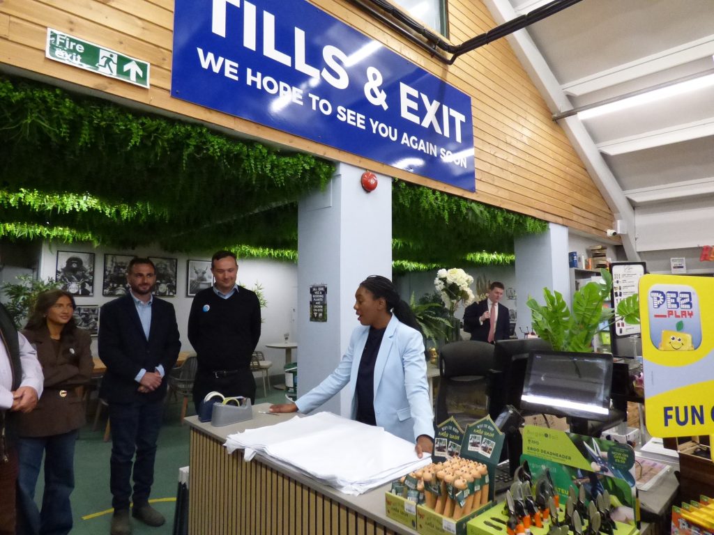 Tory leader Kemi Badenoch on the tills at Thompsons of Crews Hill