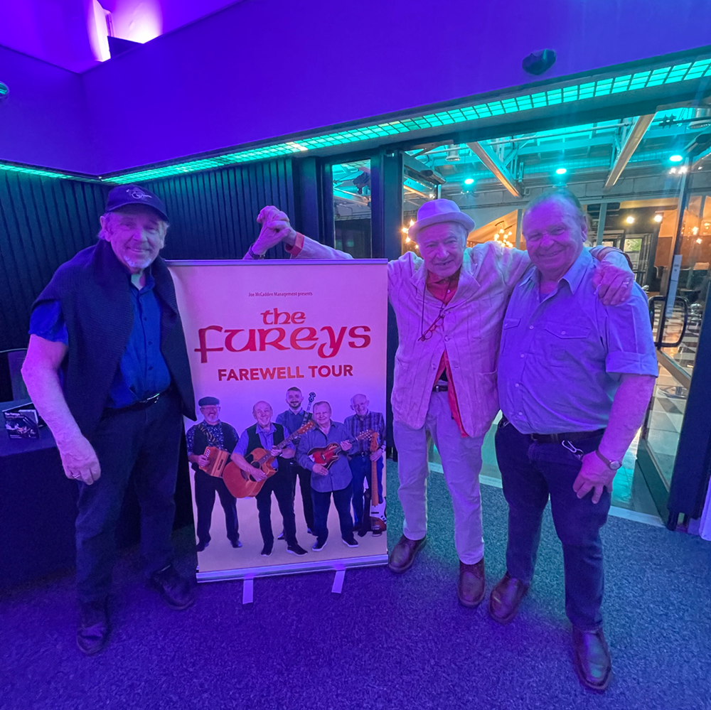 The Fureys (Eddie left and George right) with Mick McDonagh (centre)