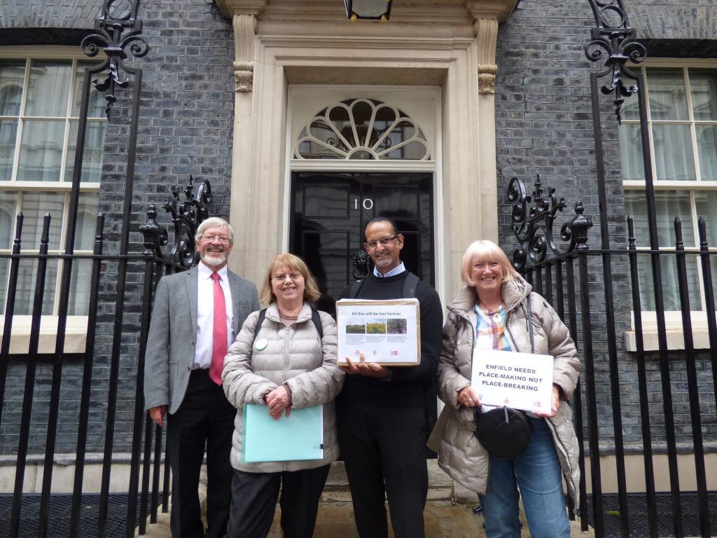 Local campaigners outside 10 Downing Street (from left) John West, Carol Fisk, Ian D'Souza and Vicki Pite