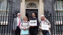 Local campaigners outside 10 Downing Street (from left) John West, Carol Fisk, Ian D'Souza and Vicki Pite