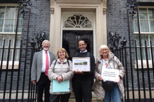 Local campaigners outside 10 Downing Street (from left) John West, Carol Fisk, Ian D'Souza and Vicki Pite