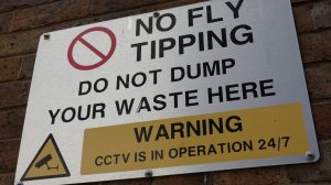 A sign warning against fly-tipping