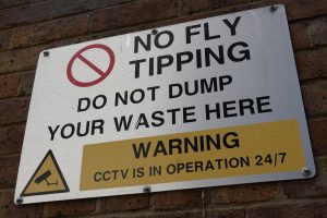 A sign warning against fly-tipping
