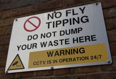 A sign warning against fly-tipping