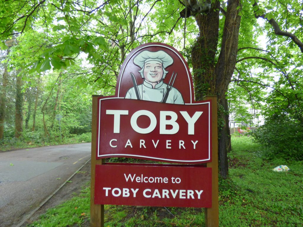 The sign outside the Toby Carvery at Whitewebbs