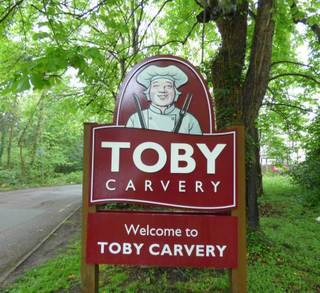 The sign outside the Toby Carvery at Whitewebbs