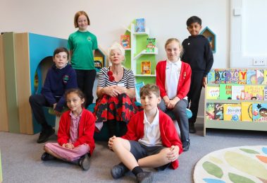 Local children’s author Jeanne Willis joins Walker Primary School pupils for the launch of the school's new library