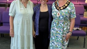 One-to-One boss Fiona Jackson (left), music therapist Camilla Farrant, and Enfield mayor Emma Supple