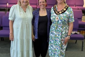 One-to-One boss Fiona Jackson (left), music therapist Camilla Farrant, and Enfield mayor Emma Supple