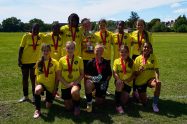 The Enfield Girls Football Youth Games team with their trophy