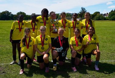 The Enfield Girls Football Youth Games team with their trophy
