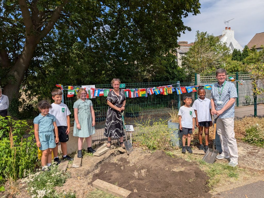 The time capsule being buried at Prince of Wales Primary School