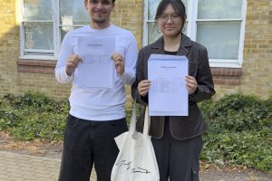 Amy Li and Leonis collecting their results at Lift Aylward School