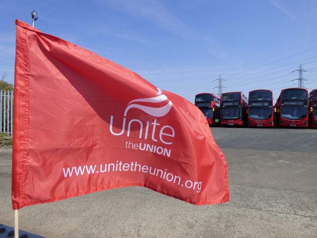 A Unite flag outside Arriva's bus depot in Edmonton