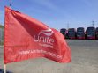 A Unite flag outside Arriva's bus depot in Edmonton