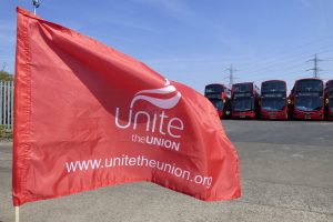 A Unite flag outside Arriva's bus depot in Edmonton