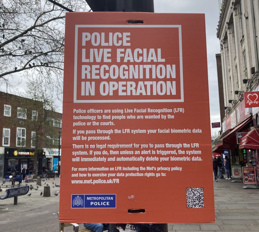 A poster warning about a live facial recognition trial