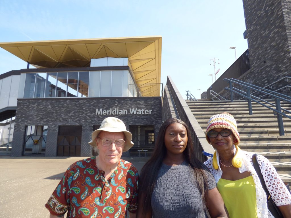 Outside Meridian Water Station, from left; React chair Alf Linney, Meridian One Homeowners Association chair Ebony Lartey, and React vice-chair Cellina Doswell