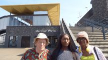 Outside Meridian Water Station, from left; React chair Alf Linney, Meridian One Homeowners Association chair Ebony Lartey, and React vice-chair Cellina Doswell