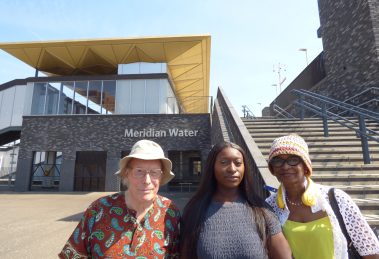 Outside Meridian Water Station, from left; React chair Alf Linney, Meridian One Homeowners Association chair Ebony Lartey, and React vice-chair Cellina Doswell