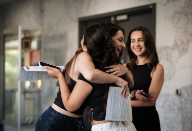 Nour Almaliki and Asya Tasdelen celebrate their results at Aylward Academy
