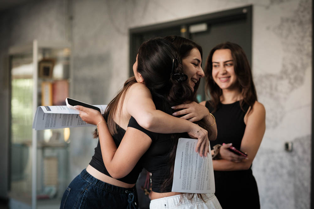 Nour Almaliki and Asya Tasdelen celebrate their results at Aylward Academy