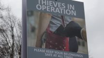 A sign warning people about phone theft