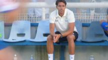 Billy Holland in the dugout at The Dave Bryant Stadium for the opening home game of the season