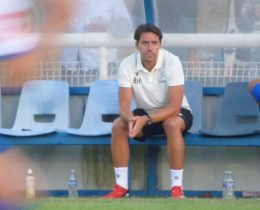 Billy Holland in the dugout at The Dave Bryant Stadium for the opening home game of the season