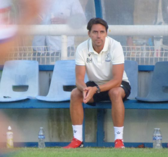 Billy Holland in the dugout at The Dave Bryant Stadium for the opening home game of the season