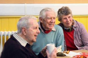 Old people enjoying a cuppa