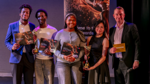 Ignite Awards winners with council cabinet member Chris Dey (right)