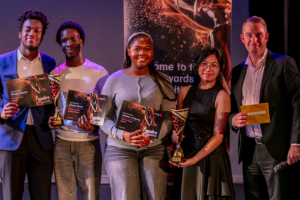 Ignite Awards winners with council cabinet member Chris Dey (right)