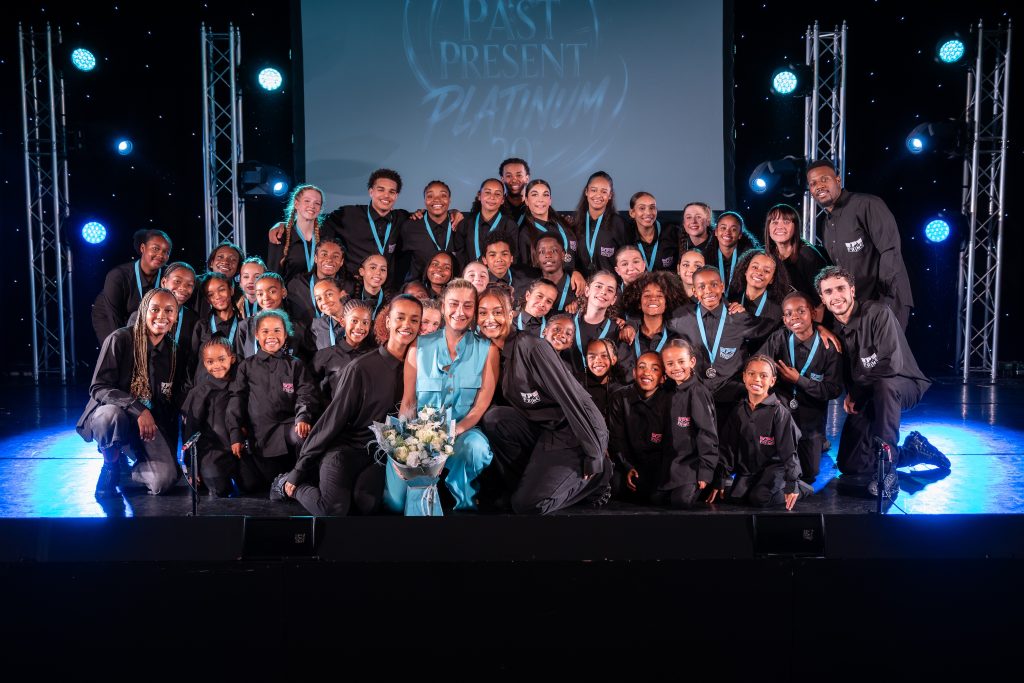 Platinum Performing Arts' end of year show, when founder Nina Lewis-Hart (centre) was presented with flowers (credit Natalie Gee)