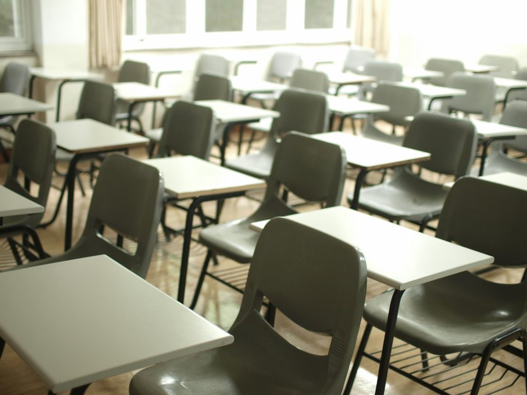 An empty classroom (credit Mche Lee via Unsplash)