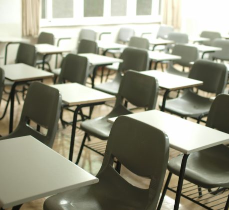 An empty classroom (credit Mche Lee via Unsplash)