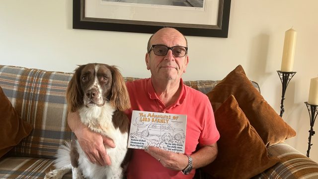Andrew Hull and Lord Barney with his new book