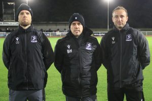 Coaches Charlie Gregory (left) and Spencer Harrison (right) either side of boss Billy Holland (credit Tom Scott)