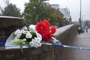 Flowers left near the scene of the shooting in Hertford Road