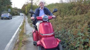 Hugh Small on his mobility scooter in Hadley Road